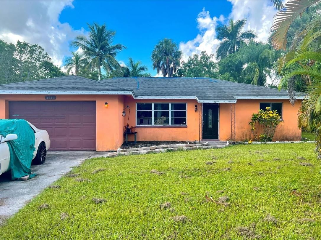 Great Fix and Flip or Hold  2 bedrooms 2 bathrooms  2 Car Garage On the Canal