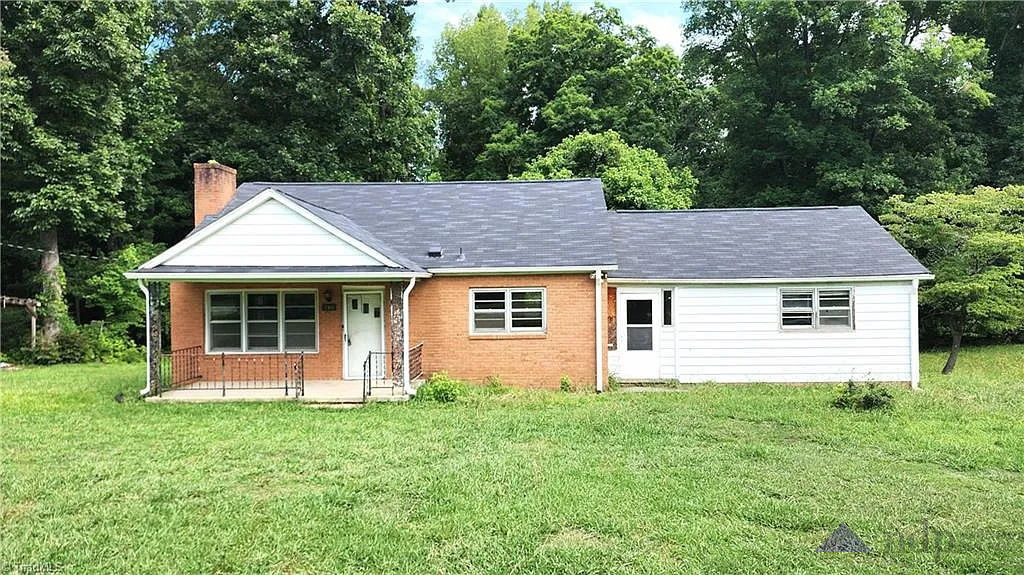Burlington Fixer-Upper with Updated Roof & Fireplace – Ready to Transform!
