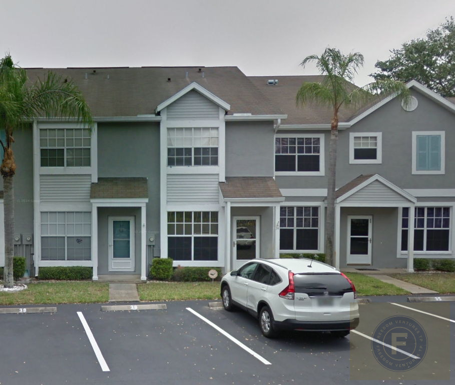 GREAT FIX AND FLIP OR BUY AND HOLD IN PALM HARBOR FL TOWNHOUSE