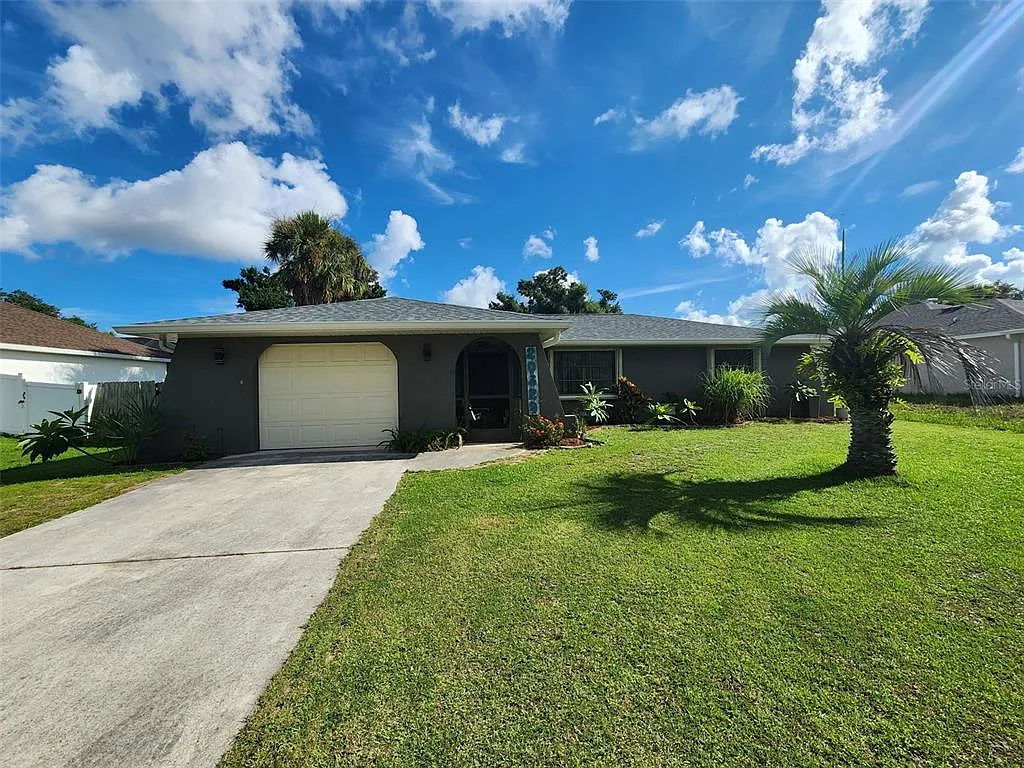 Charming 2 Bed, 2 Bath Home with Garage in Port Charlotte FL 33952