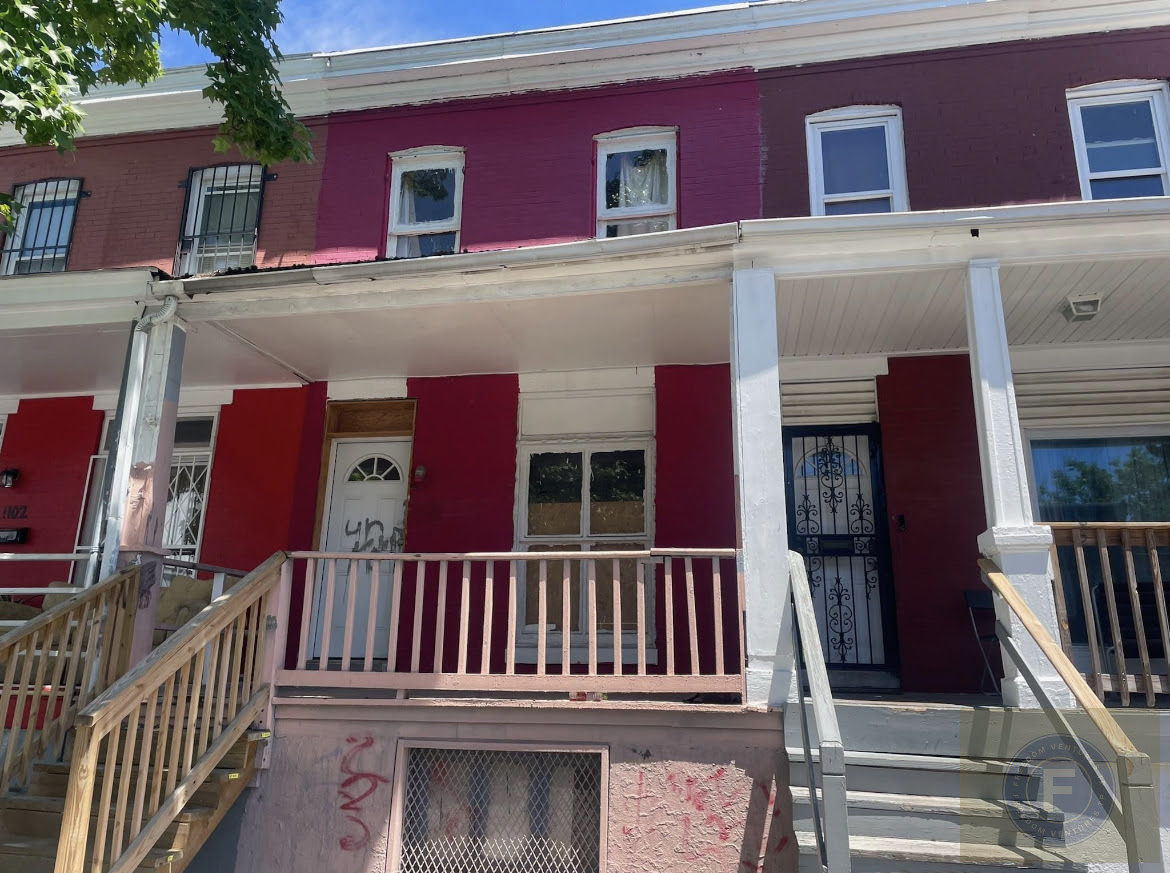GREAT FIX AND FLIP OR BUY AND HOLD TOWNHOUSE IN BALTIMORE