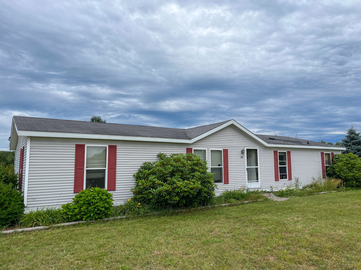 Howard City Flip on 3.5 Acres!