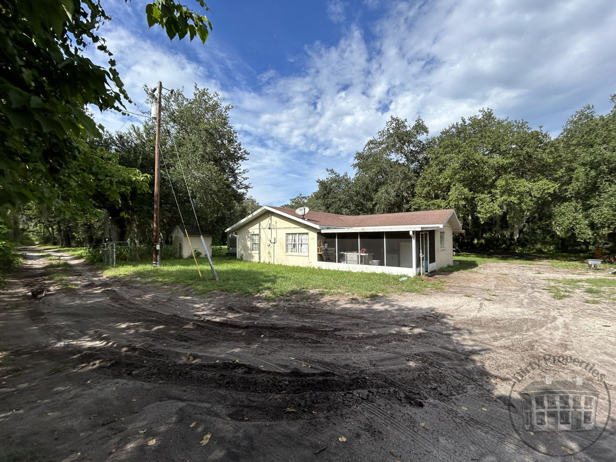 🏡 GATED 3BD/1BA Spacious Layout on 1.34 Acres in Mims, FL! Oversized Lot with Two Screened Rooms & Tons of Potential - ARV $360K! 🌴