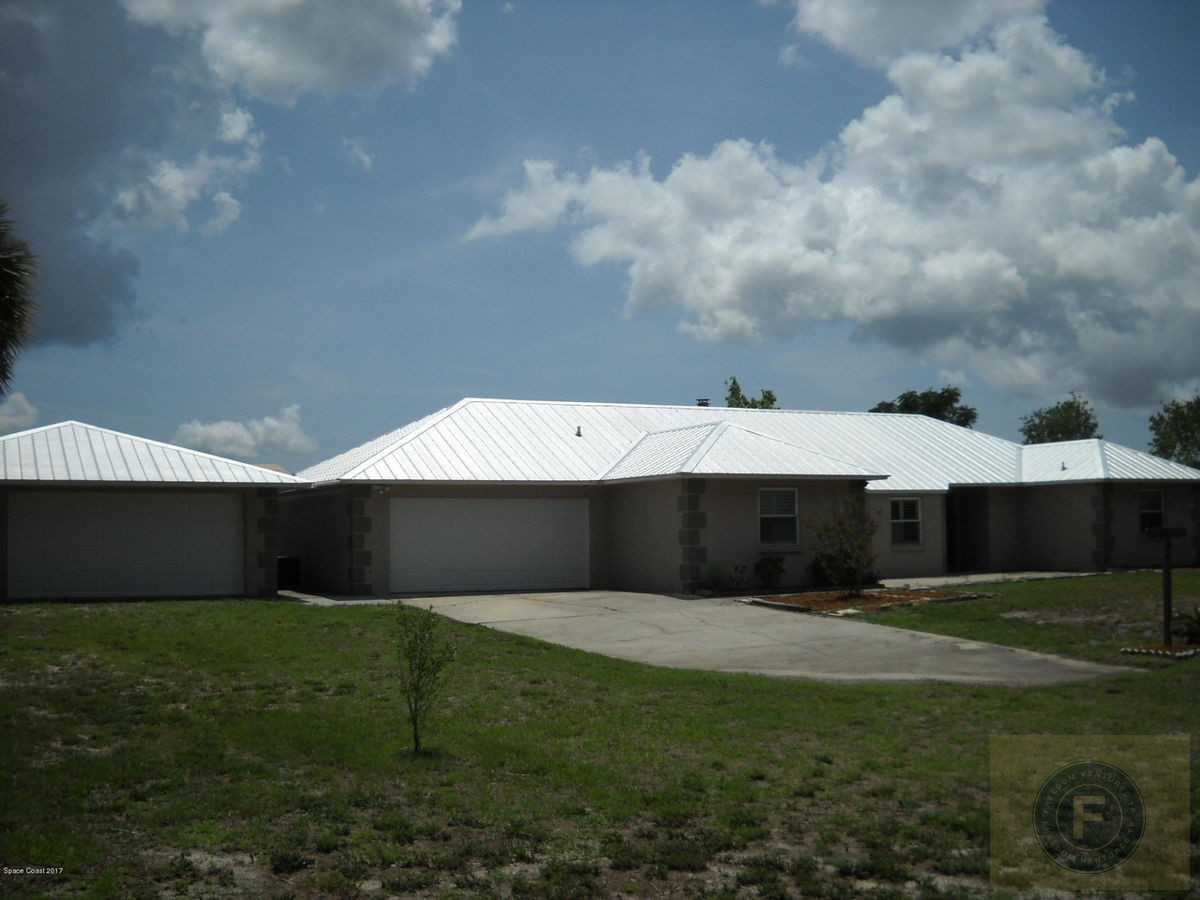 GREAT FIX AND FLIP OR BUY AND HOLD IN COCOA FL ON 2.38 ACRES