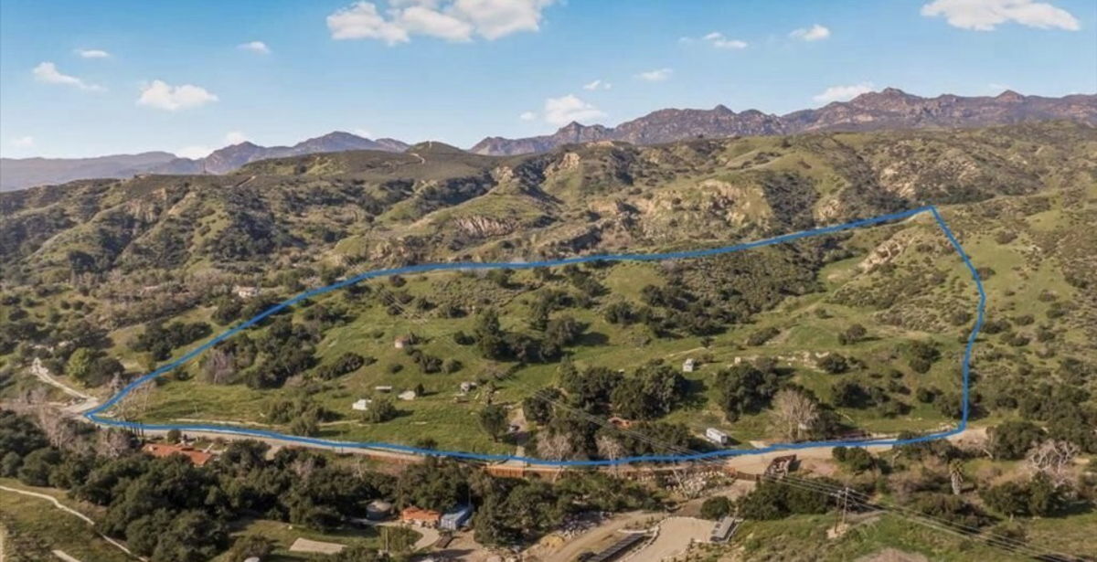DON'T MISS OUT ON 13 ACRES OF LAND WITH AN HOME ATTACHED